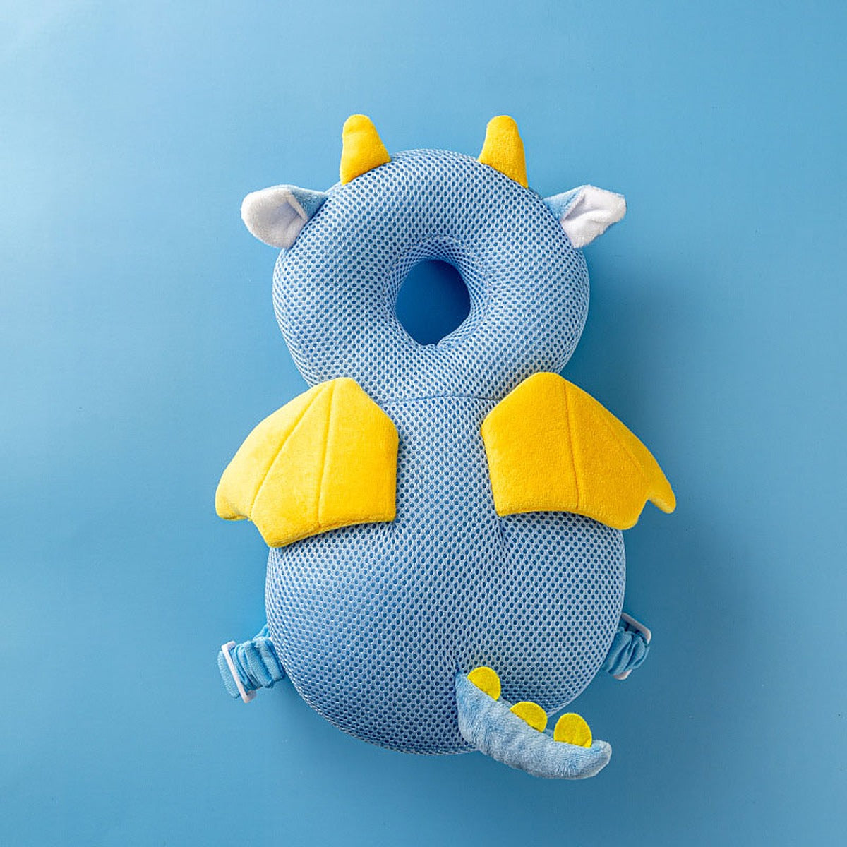 Blue dragon baby head protector in breathable mesh with yellow wings